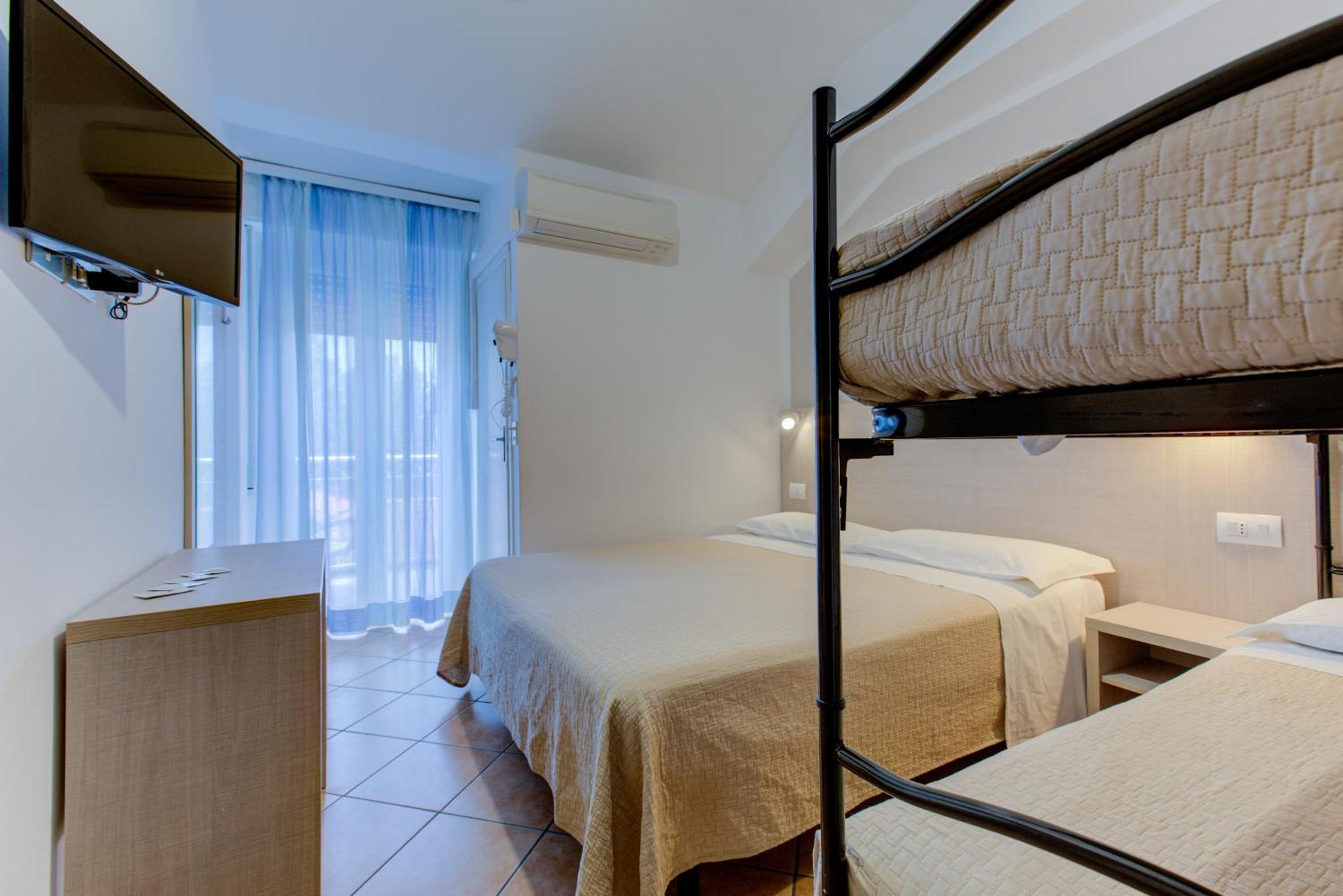 Hotel Cimarosa Riccione Pokoj fotografie